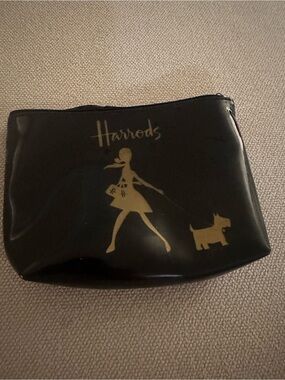 Harrods Black and Gold Walking Lady Cosmetic Pouch